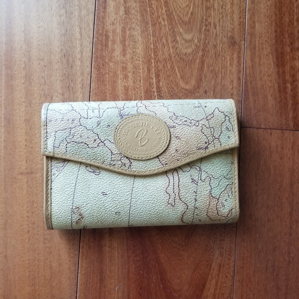 SOLD Tan wallet with world map pattern